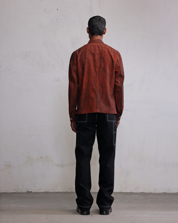 Rust coated denim jacket